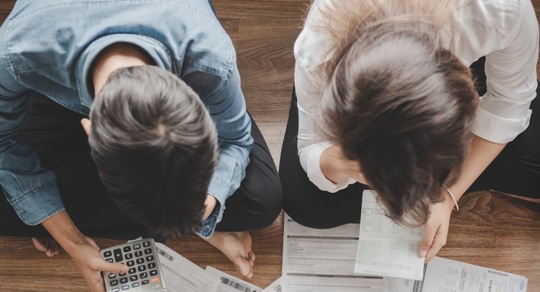 couple looking over paperwork